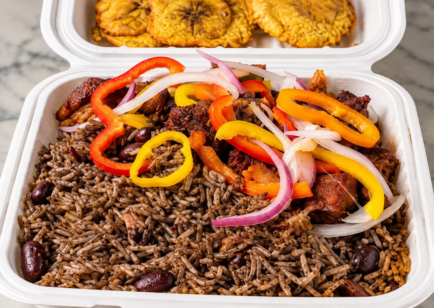 Fish (red snapper) and rice djondjon at Caribbean Latino Finger Licking Restaurant Edmonton