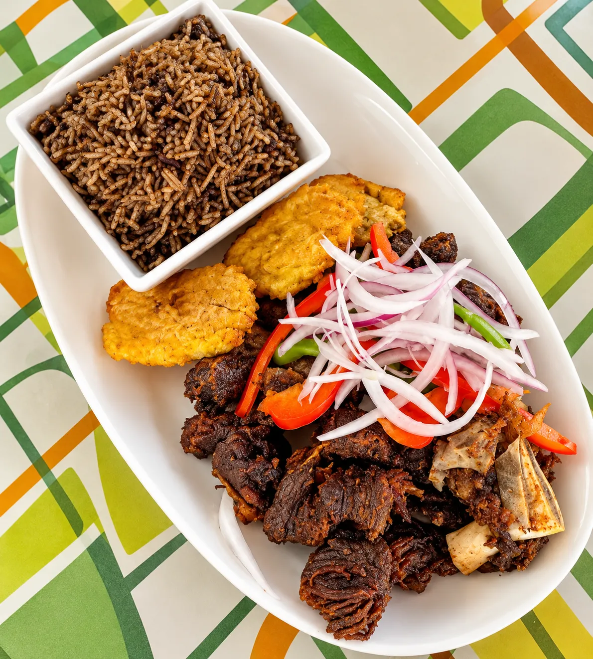 Goat and rice at Caribbean Latino Finger Licking Restaurant Edmonton